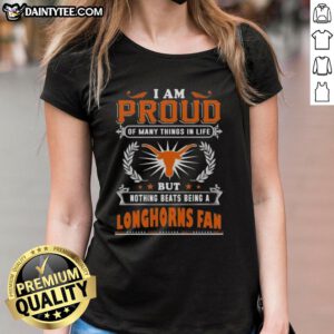 Happy Texas Longhorns fan wearing a proud ladies tee, celebrating their love for the team and Texas spirit.