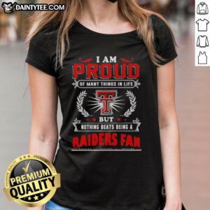 Happy Texas Tech Red Raiders fan wearing a ladies tee, proud of her team and celebrating school spirit.