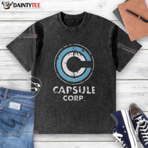Alt Text: Distressed Capsule Corp logo on a washed t-shirt from Dragon Ball Z, perfect for fans of the anime series.
