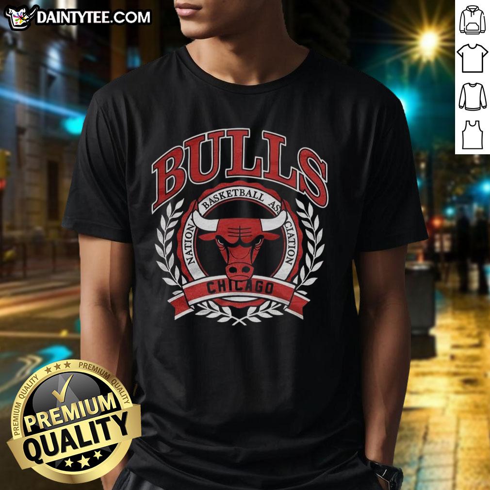 Alt Text: Retro Chicago Bulls NBA logo T-shirt with laurel wreath frame, perfect for fans and collectors.