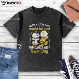 Charlie Brown and Snoopy dancing together on a washed t-shirt, perfect for dog lovers and music enthusiasts.