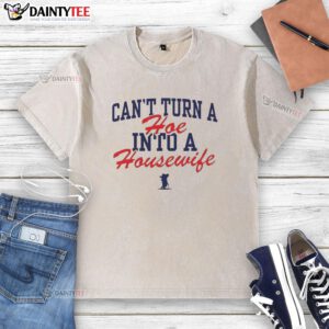 Official Ole Miss Rebels 'Can't Turn A Hoe Into A Housewife' washed t-shirt featuring bold graphic design and school colors.