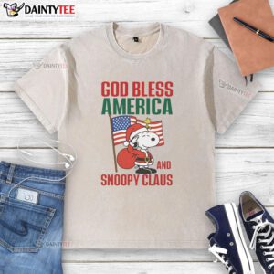 Official Peanuts God Bless America and Snoopy Claus washed t-shirt featuring festive Snoopy design for patriotic fans.