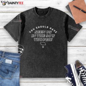 Alt Text: Retro Nebraska map graphic on a washed t-shirt, perfect for 90s nostalgia lovers and vintage fashion enthusiasts.