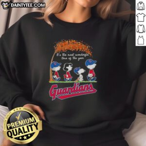 Alt Text: Premium Cleveland Guardians X Peanuts Snoopy and Friends sweatshirt, perfect for autumn and celebrating the season's joy.