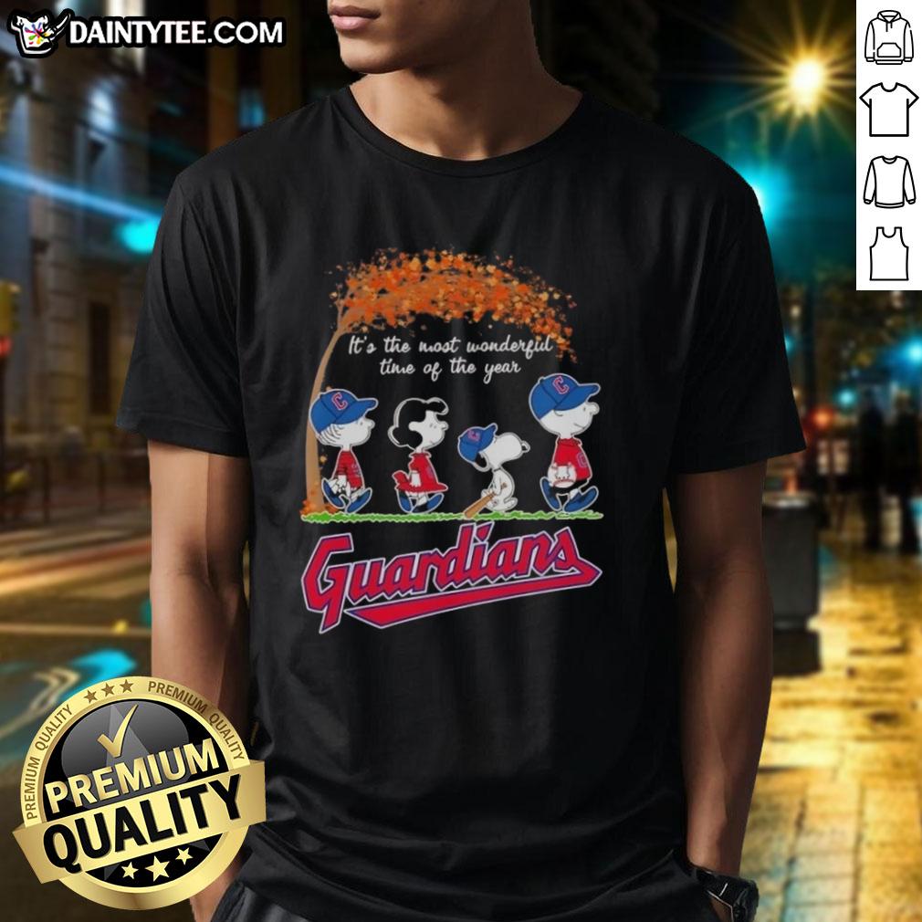 Premium Cleveland Guardians X Peanuts Snoopy and Friends autumn T-shirt featuring festive design for the holiday season.