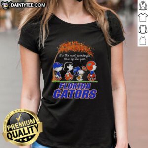 Premium Florida Gators tee featuring Snoopy and friends, perfect for autumn and the holiday season, celebrating the joy of fall.