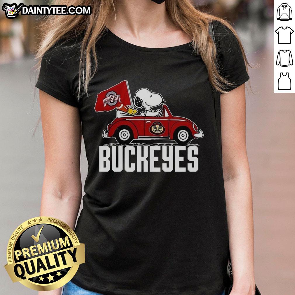 Alt Text: Premium Snoopy and Woodstock driving a car with Ohio State Buckeyes flag on a ladies tee shirt design.