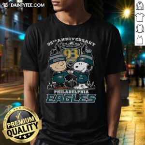 Alt Text: Premium Snoopy Touch Hands Charlie Brown X Philadelphia Eagles 93rd Anniversary T-Shirt, celebrating 1933-2026.