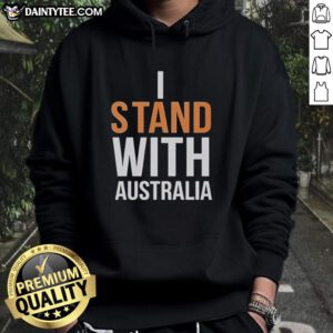 Person wearing 'Stand With Australia' hoodie at Bondi Beach, showcasing support and Australian pride in a vibrant setting.