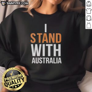 Top I Stand With Australia sweatshirt at Bondi Beach, showcasing vibrant design and beachside views.