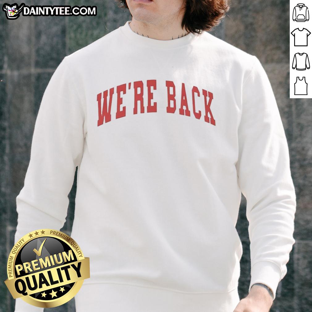 Alt Text: Red letter sweatshirt with 'We're Back' printed on the front, perfect for casual wear and trendy outfits.