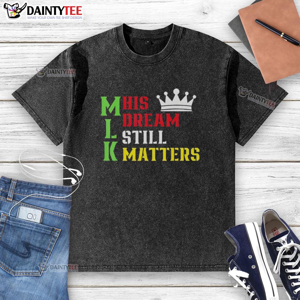 Awesome His Dream Still Matters Martin Luther King Day Human Rights washed t-shirt displayed on a hanger.