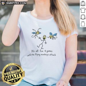 Awesome 'It's All Fun And Games Until The Flying Monkeys Attack' ladies tee featuring a playful graphic design.