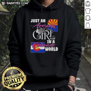 Alt Text: Arizona girl wearing 'Just An Arizona Girl In A Colorado World' hoodie, showcasing a stylish, cozy look in nature.