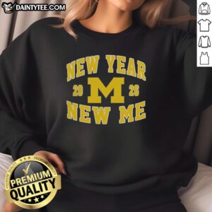 Alt Text: Awesome Michigan Wolverines Football New Year New Me 2026 logo sweatshirt featuring bold colors and sporty design.