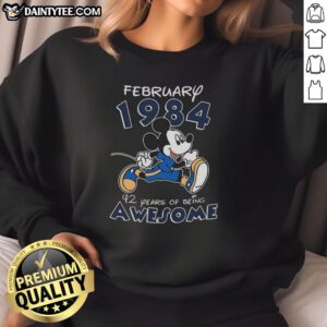 Alt Text: Awesome Mickey Mouse February 1984 sweatshirt celebrating 42 years of being awesome with vibrant graphic design.