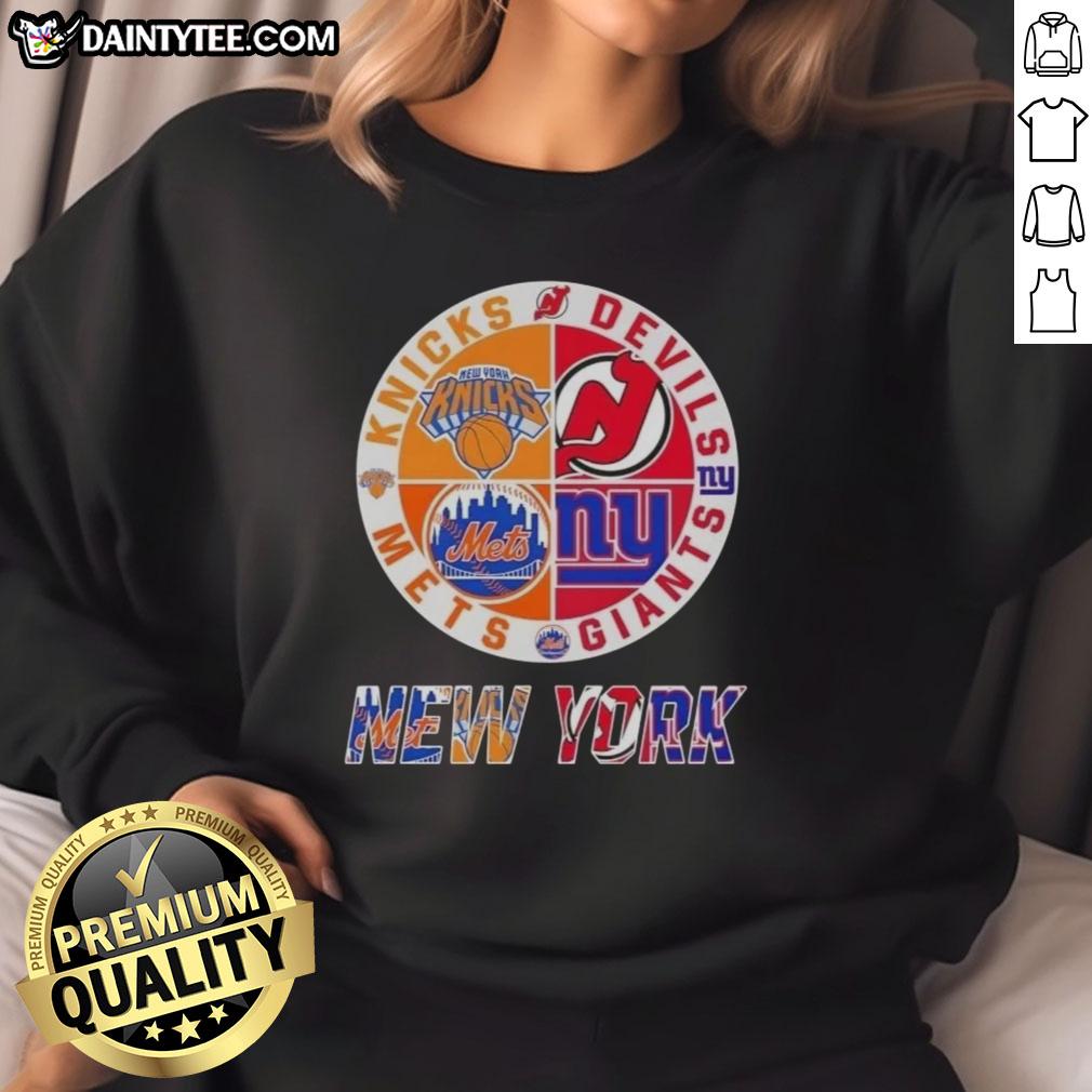 Awesome New York City sports sweatshirt featuring Knicks, Devils, Giants, and Mets logos in a stylish design.