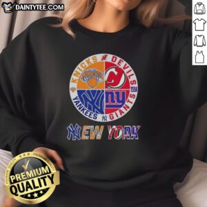 Alt Text: Awesome New York City sports sweatshirt featuring Knicks, Devils, Giants, and Yankees logos in a stylish design.