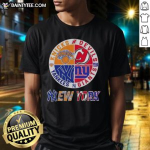 Awesome New York City Sports T-Shirt featuring Knicks, Devils, Giants, and Yankees logos in a stylish design.