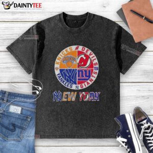 Awesome New York City sports t-shirt featuring Knicks, Devils, Giants, and Yankees logos in a stylish, washed design.
