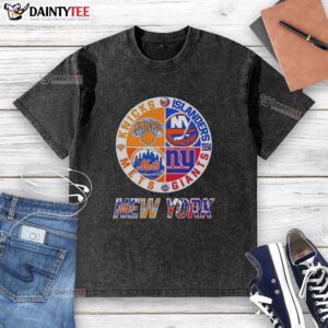 Awesome New York City sports logos on a washed t-shirt featuring Knicks, Islanders, Giants, and Mets designs.