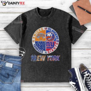 Awesome New York City sports t-shirt featuring Knicks, Islanders, Giants, and Yankees logos on a stylish washed design.