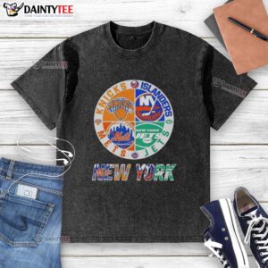 Awesome New York City sports logos on a washed t-shirt featuring Knicks, Islanders, Jets, and Mets designs.