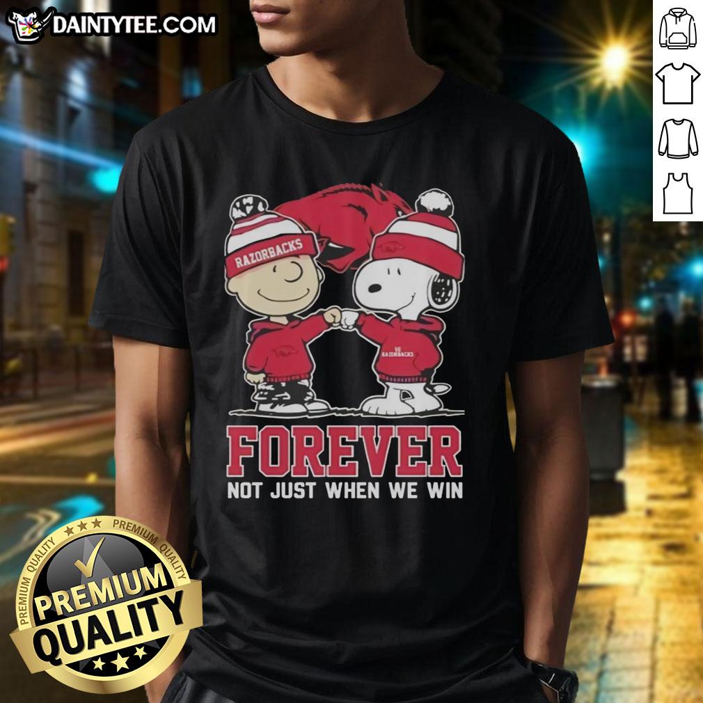 Alt Text: Awesome Peanut Snoopy and Charlie Brown Arkansas Razorbacks T-Shirt celebrating fandom, not just victories.