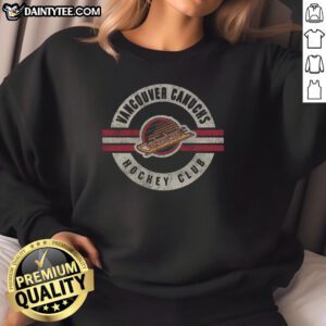 Vintage Vancouver Canucks sweatshirt featuring a stylish surround design, perfect for fans and collectors.