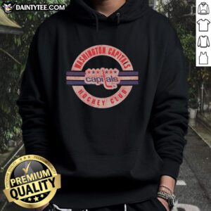 Alt Text: Vintage Washington Capitals hoodie surrounded by sports memorabilia, showcasing team colors and logo for fans.