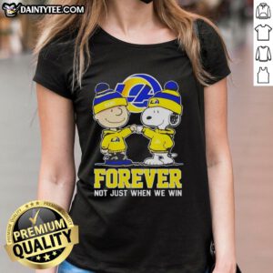Cute Peanut Snoopy and Charlie Brown graphic on a Los Angeles Rams Forever tee for ladies, perfect for NFL fans.