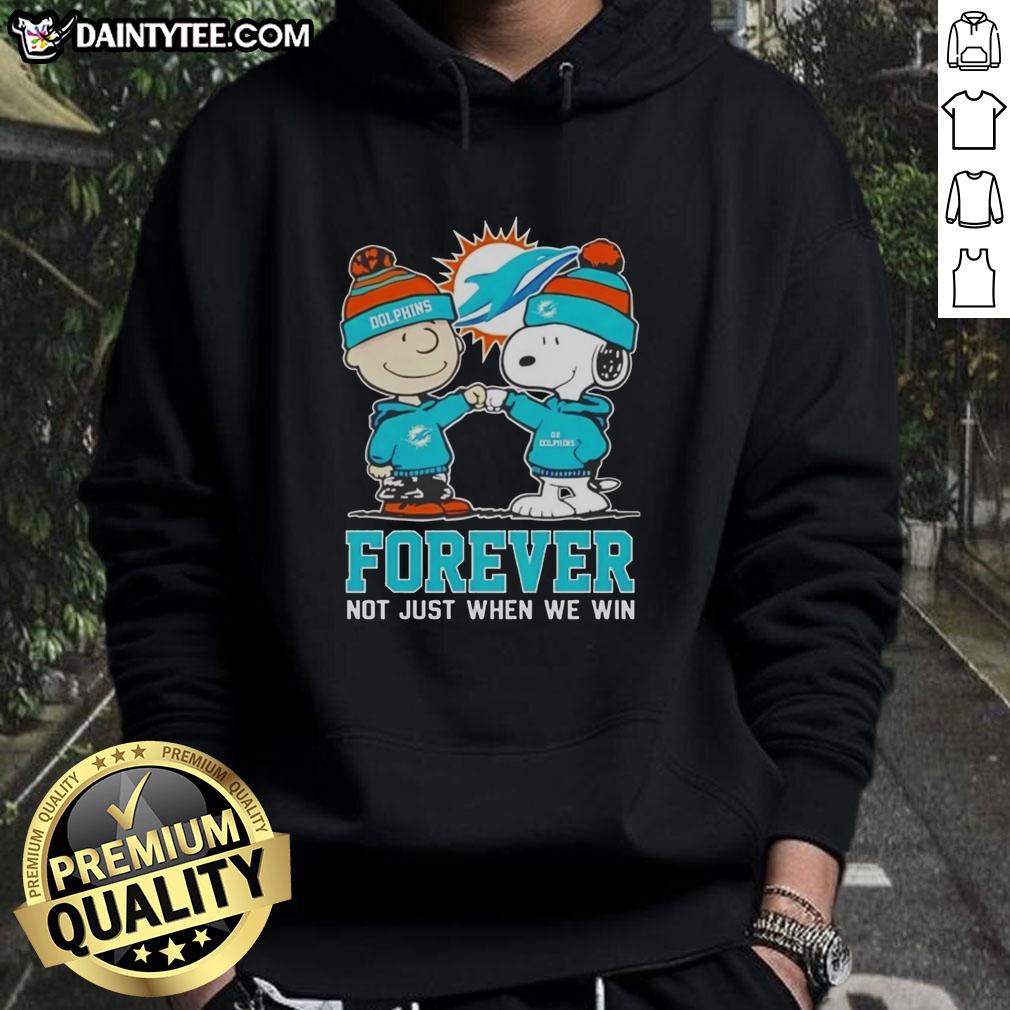 Alt Text: Cute Peanut Snoopy and Charlie Brown on Miami Dolphins hoodie, celebrating fandom with Forever, Not Just When We Win slogan.