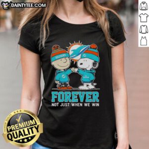 Alt Text: Cute Peanut Snoopy and Charlie Brown Miami Dolphins Forever tee for ladies, celebrating team spirit and fandom.