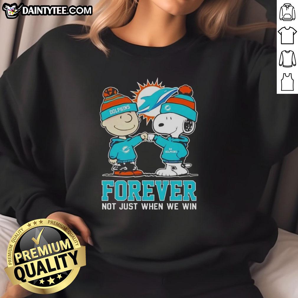 Alt Text: Cute Peanut Snoopy and Charlie Brown Miami Dolphins sweatshirt, perfect for fans who love the team all season long.