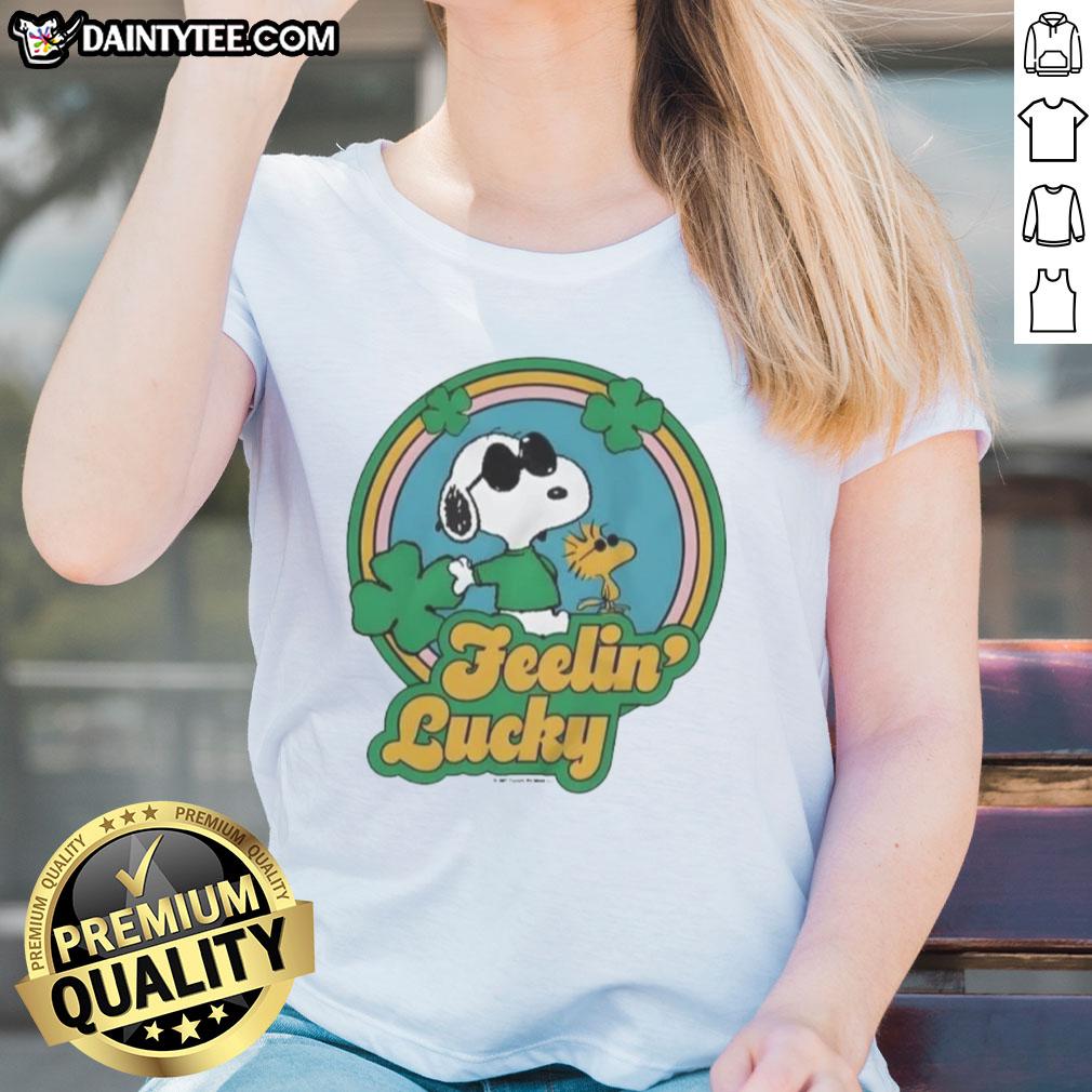 Alt Text: Cute Peanuts Shamrock Feeling Lucky Ladies Tee featuring playful design and vibrant colors for St. Patrick's Day.