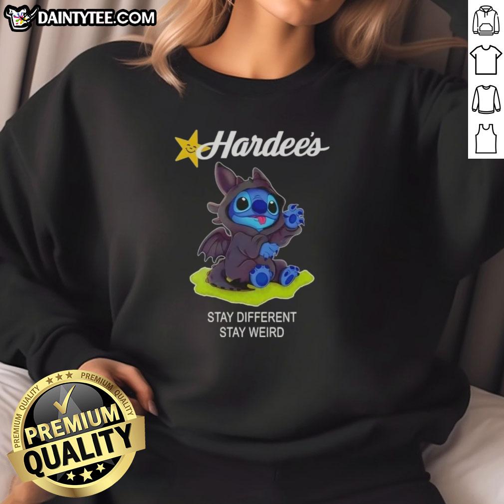 Cute Stitch cosplay wearing a Toothless x Hardee's 'Stay Different, Stay Weird' sweatshirt, showcasing fun character style.