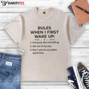 Funny rules for waking up on a washed t-shirt, featuring humorous graphics and playful text for a lighthearted morning vibe.