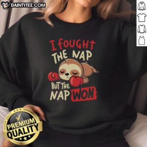 Funny sloth boxing in a sweatshirt with 'I fought the nap but the nap won' text, perfect for nap lovers.