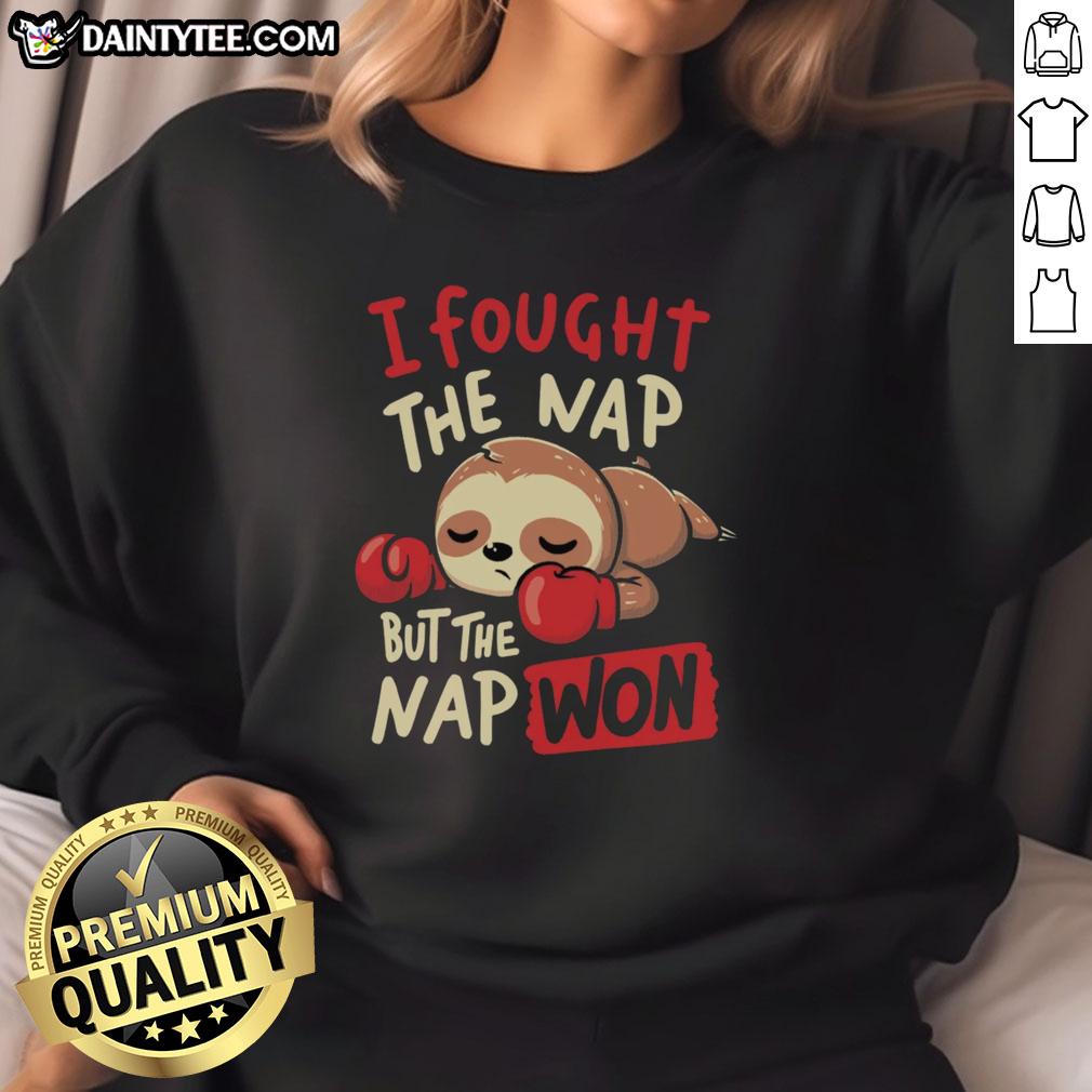Funny sloth boxing in a sweatshirt with 'I fought the nap but the nap won' text, perfect for nap lovers.