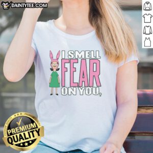 Alt Text: Louise from Bob's Burgers wearing 'I Smell Fear On You' tee, showcasing her playful character and unique style.