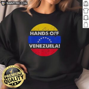 Retro sweatshirt featuring I Stand With Venezuela slogan and a circular flag design, perfect for activism and casual wear.