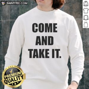 Kiernan Shipka wearing a stylish 'Come And Take It' sweatshirt, showcasing trendy casual fashion.