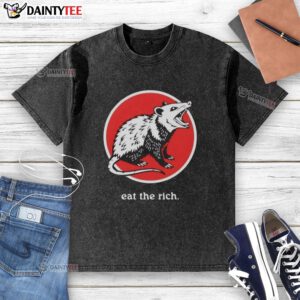 Funny 'Eat The Rich' opossum graphic on a washed t-shirt, perfect for casual wear and humor lovers.
