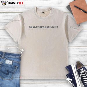 Alt Text: Vintage Good Radiohead Plug Me In I'm Your Best Friend washed t-shirt displayed on a wooden background.