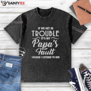 Happy child wearing a 'If We Get in Trouble It's My Papa's Fault' t-shirt, showcasing a playful family bond.