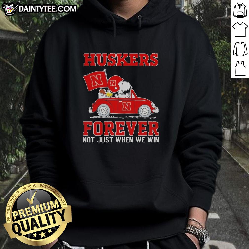 Alt Text: Hot Snoopy and Woodstock driving a car while wearing Nebraska Huskers hoodie, showcasing team spirit and fun.