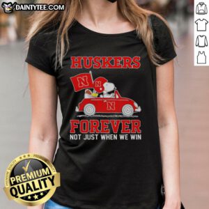 Alt Text: Hot Snoopy and Woodstock driving a car in a Nebraska Huskers ladies tee, showcasing playful team spirit.