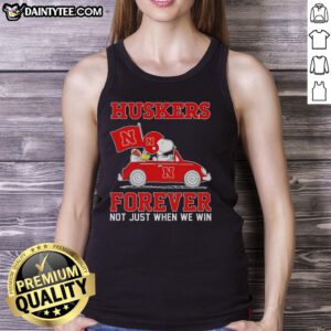 Hot Snoopy and Woodstock driving a car in Nebraska Huskers tank top, showcasing vibrant fan spirit and fun.