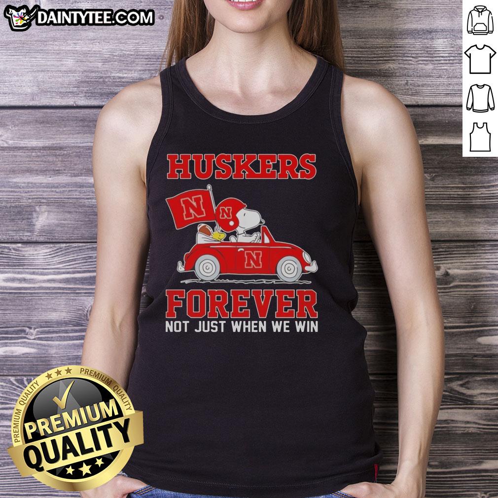 Hot Snoopy and Woodstock driving a car in Nebraska Huskers tank top, showcasing vibrant fan spirit and fun.